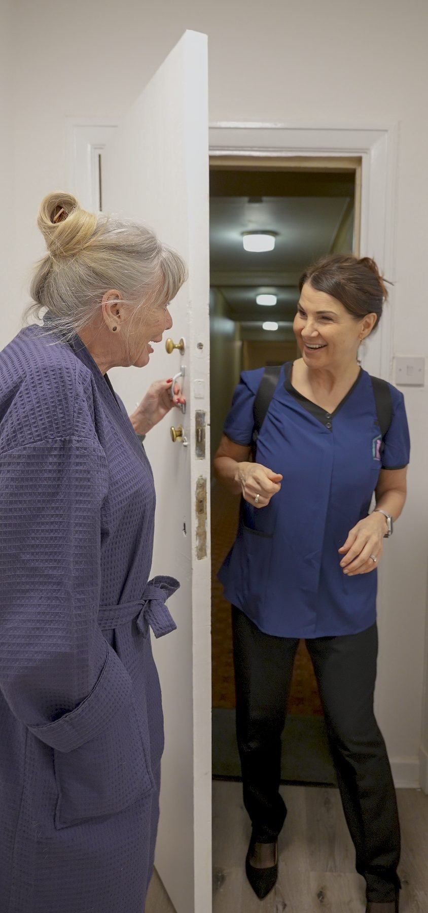 A warm greeting between carer and client