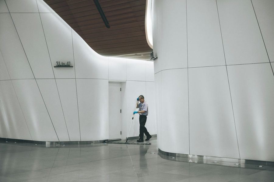 A cleaner maintaining a large commercial building